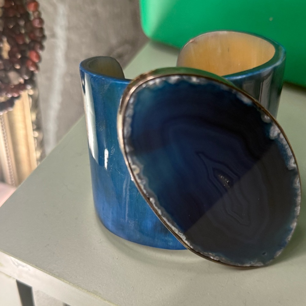 A Modernist Brass Cuff Bracelet with a Large Solidite or Blue Stone